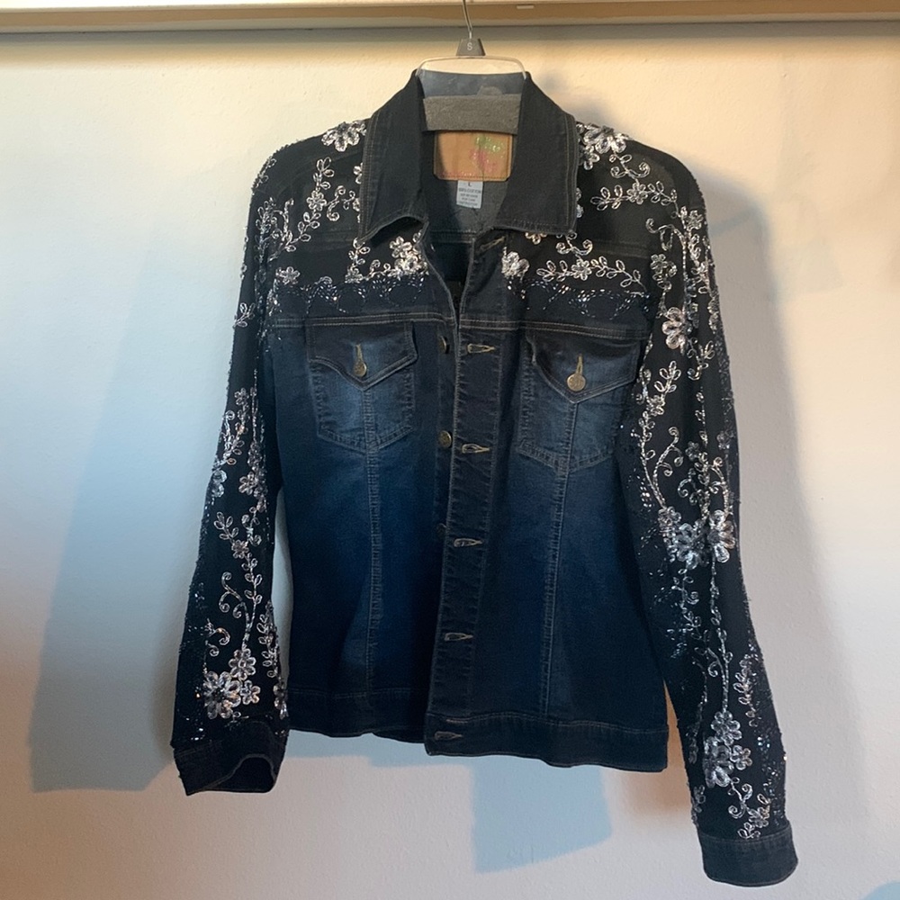 Embellishee jean jacket worh mesh panels in back and sleeves